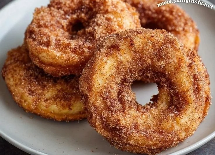 Delicious air fryer cinnamon apple rings served on a plate