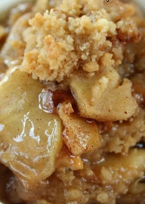 Delicious Apple Pear Walnut Crisp topped with a golden, crunchy crumble and walnuts.