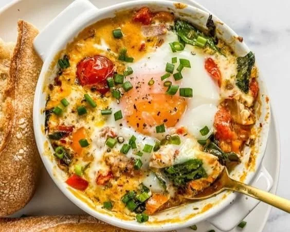 Baked Feta Eggs with Tomatoes and Spinach