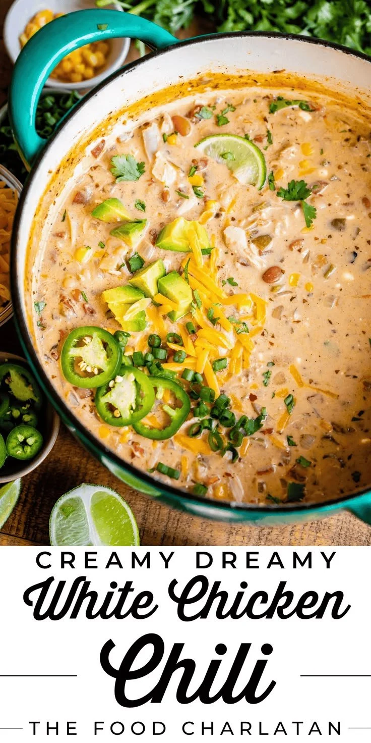 Bowl of creamy white chicken chili topped with cilantro and lime.