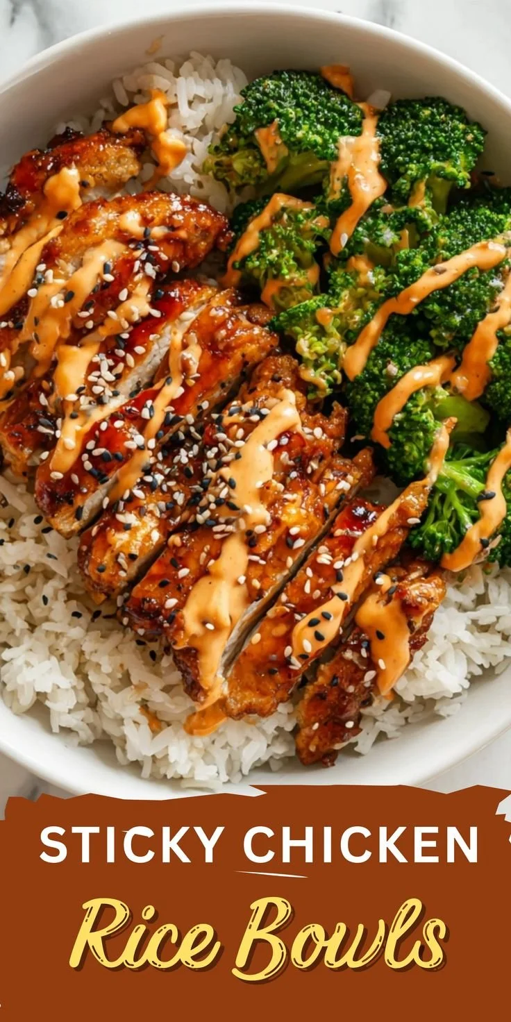 Delicious sticky chicken rice bowl served with fresh vegetables and herbs