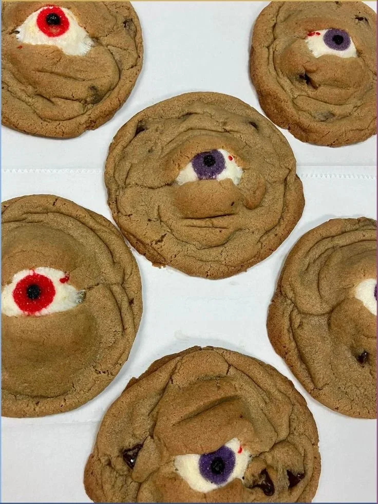 Spooky Halloween cookies decorated with ghosts and pumpkins