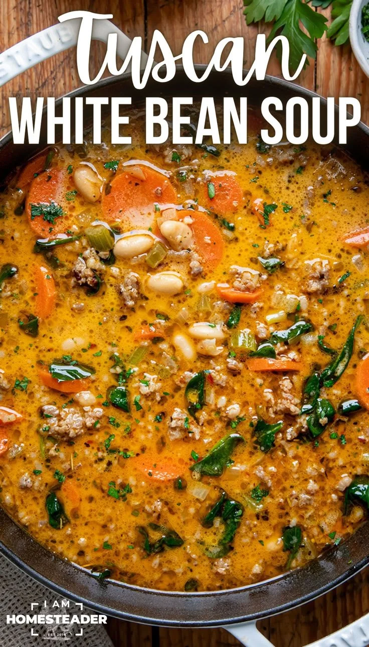 Bowl of hearty Tuscan White Bean Soup garnished with fresh herbs