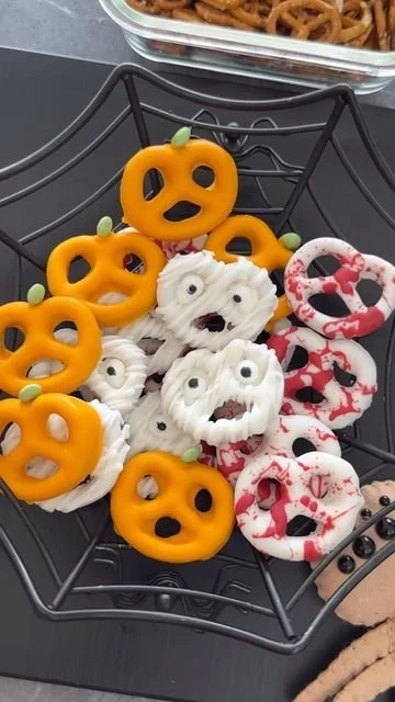 Colorful Halloween pretzels decorated for spooky snacks
