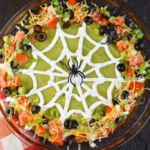 easy spooky halloween 7 layer taco dip recipe ha 2026 08 06 192200 683x1024 1