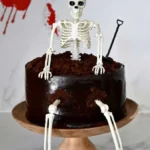 spooky skeleton cake the ultimate halloween party 2026 08 06 192222 679x1024 1